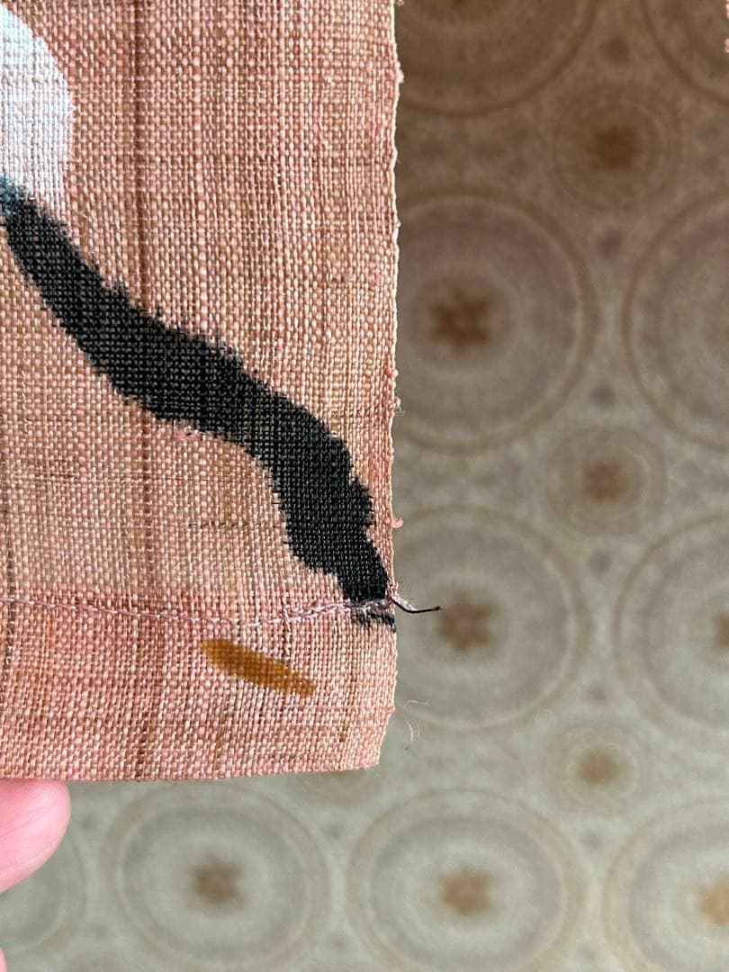 桜の花模様の薄いピンクのれん