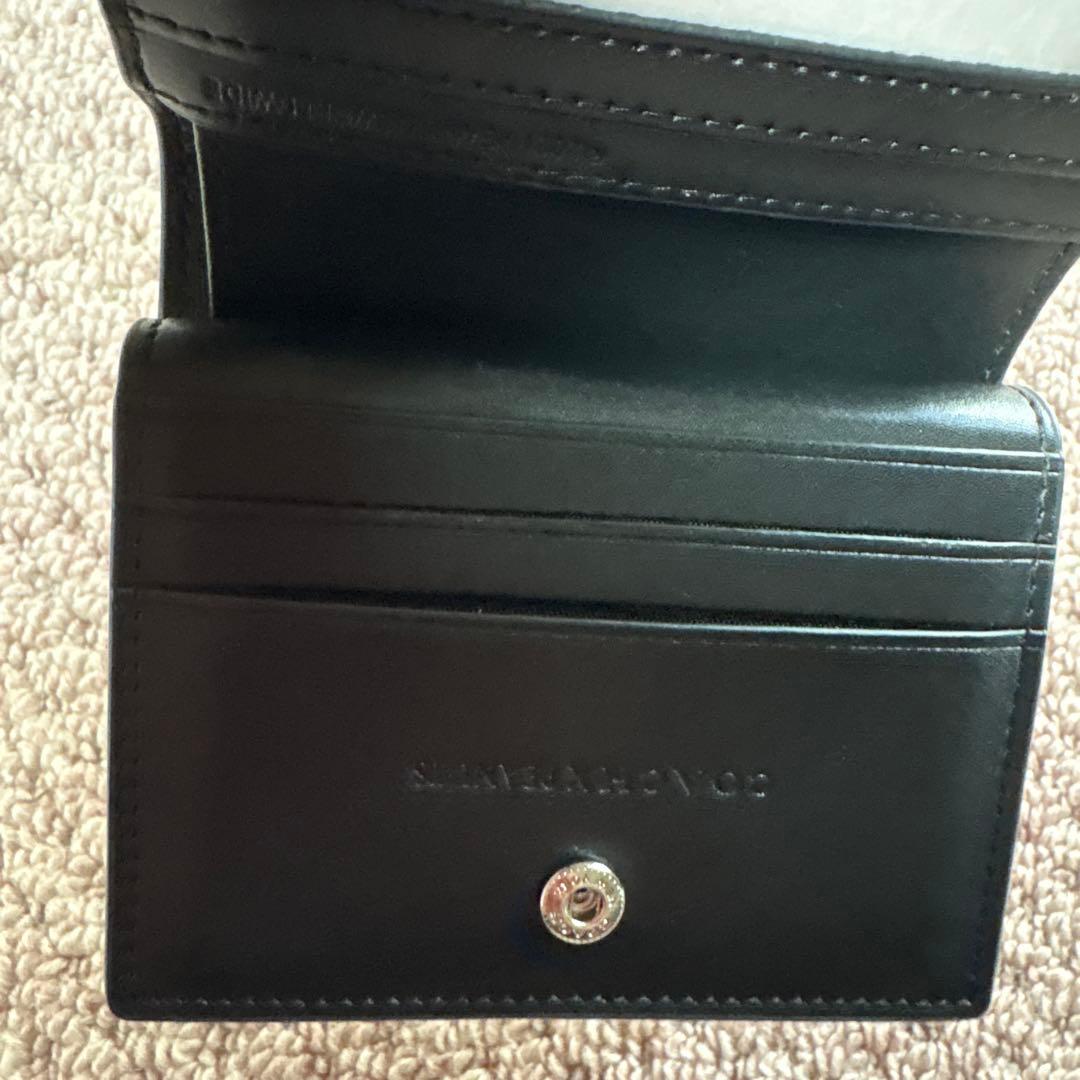 COACH 　二つ折り財布　ｃチャーム　スヌーピー