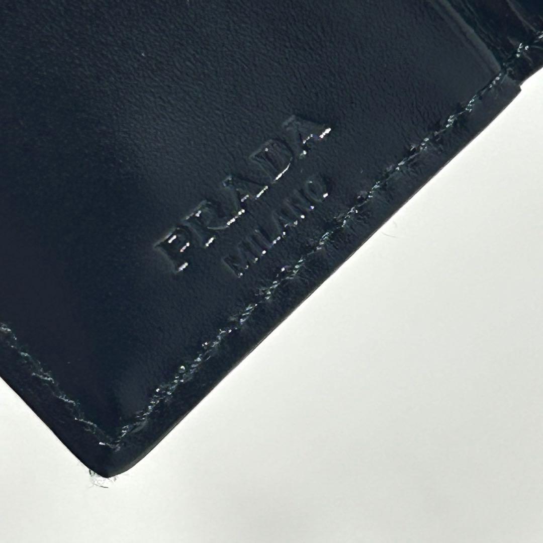 プラダ 6連キーケース サテン トライアングルロゴ レザー 黒 シルバー ロゴ