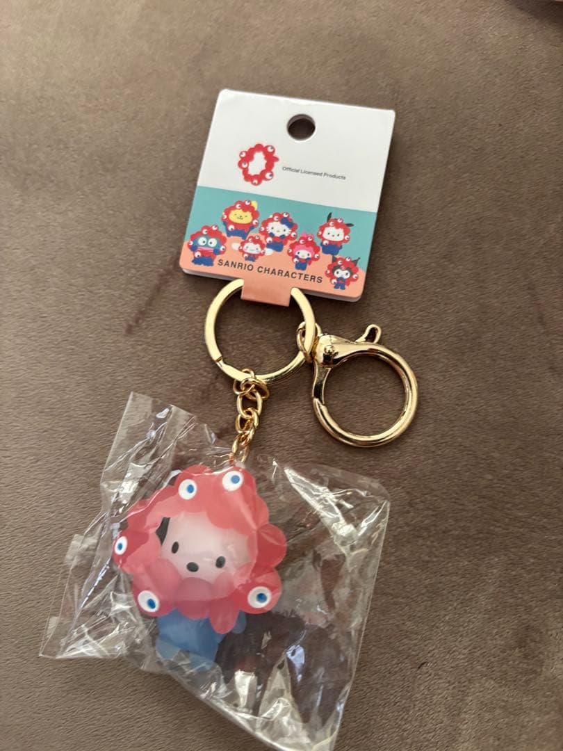 大阪関西万博 サンリオ 黒ミャクミャクなりきり立体キーホルダー 黒キティ