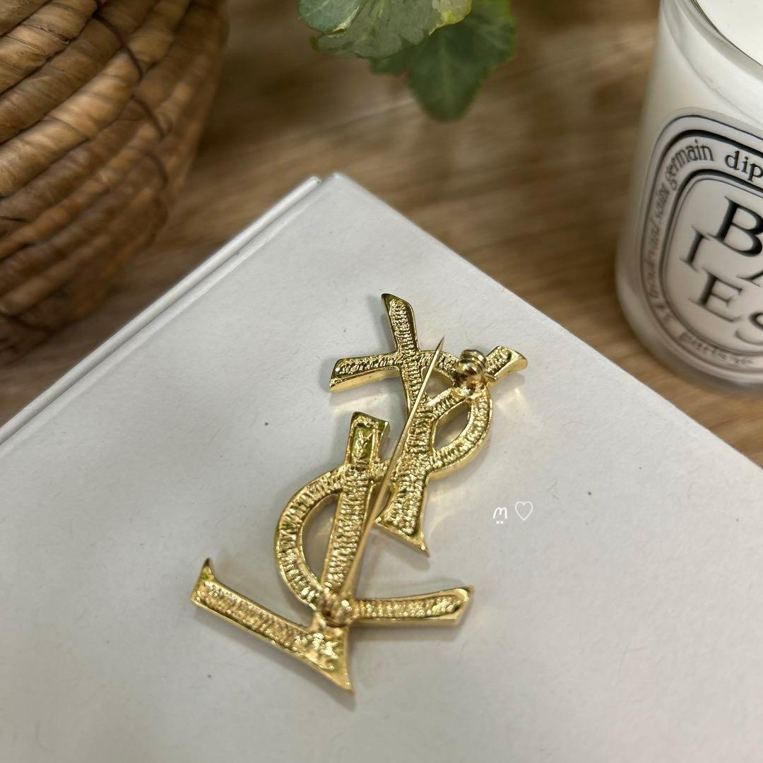 イヴサンローラン　YSLロゴ　ラインストーンブローチ　カサンドラ　スワロフスキー