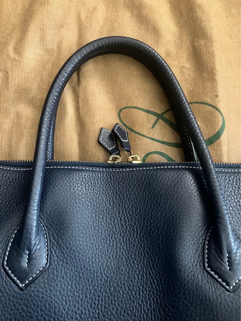 Cisei 999 LD シュリンクレザー ラウンドジップ ブリーフバッグ