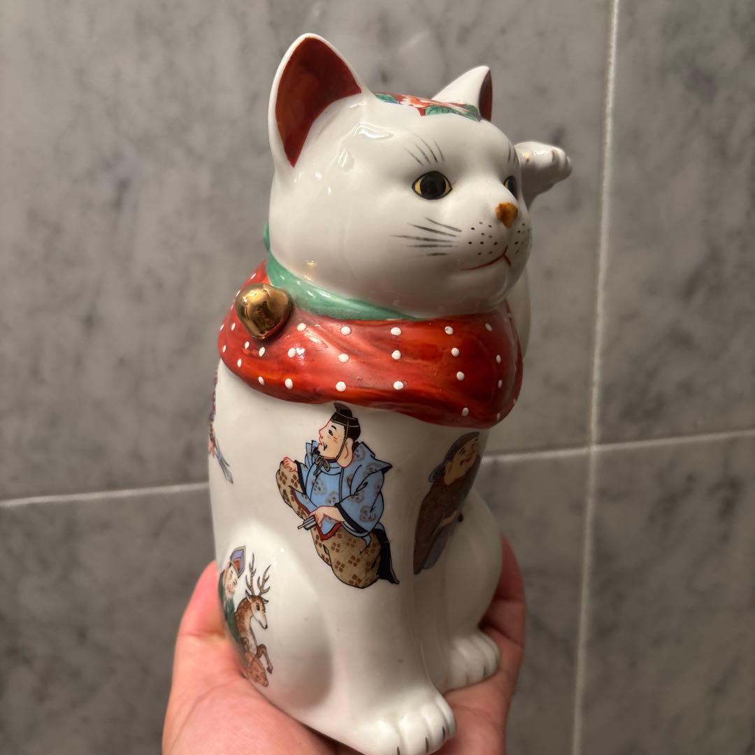 ヴィンテージ縁起の良い七福神が描かれ、可愛らしい瞳の招き猫