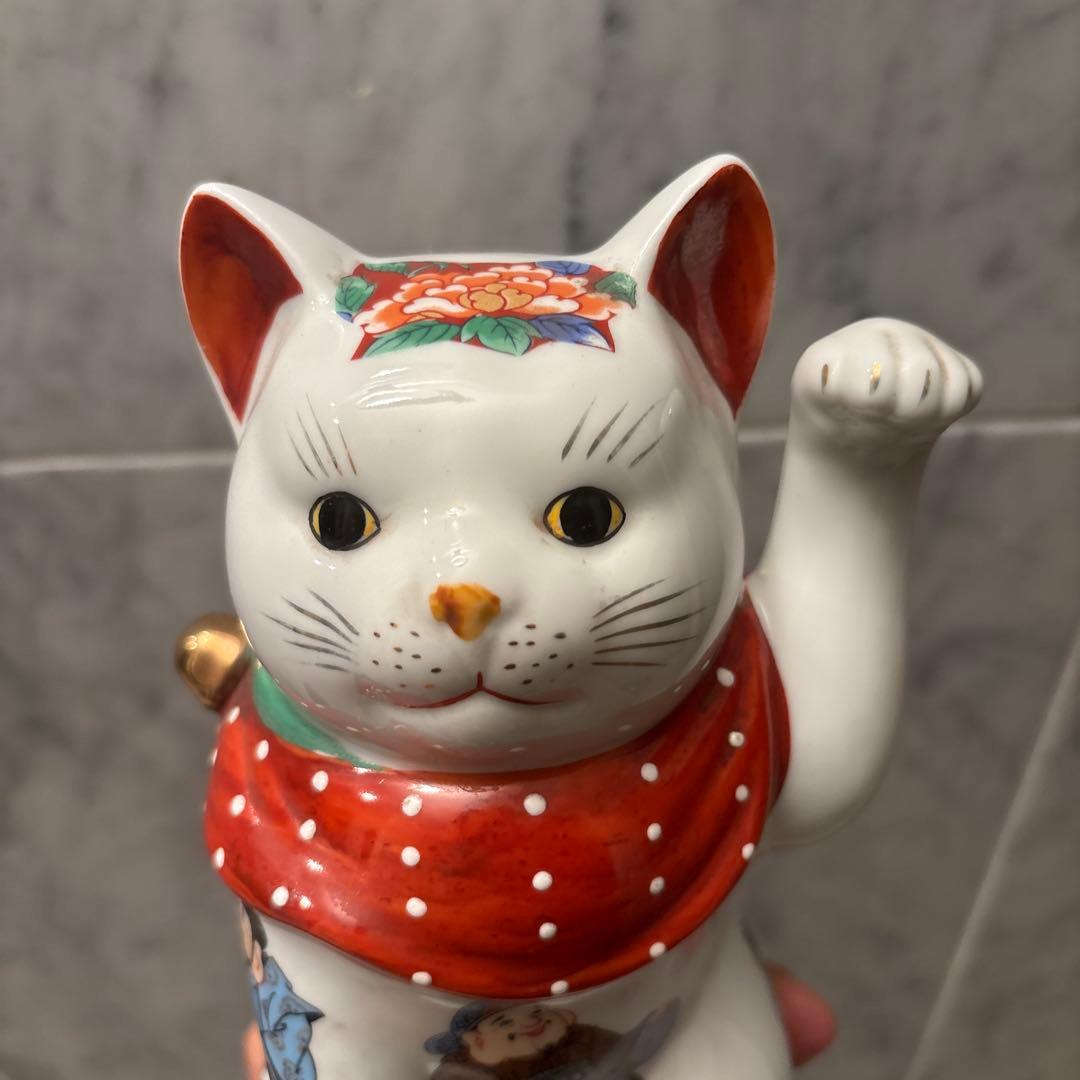 ヴィンテージ縁起の良い七福神が描かれ、可愛らしい瞳の招き猫