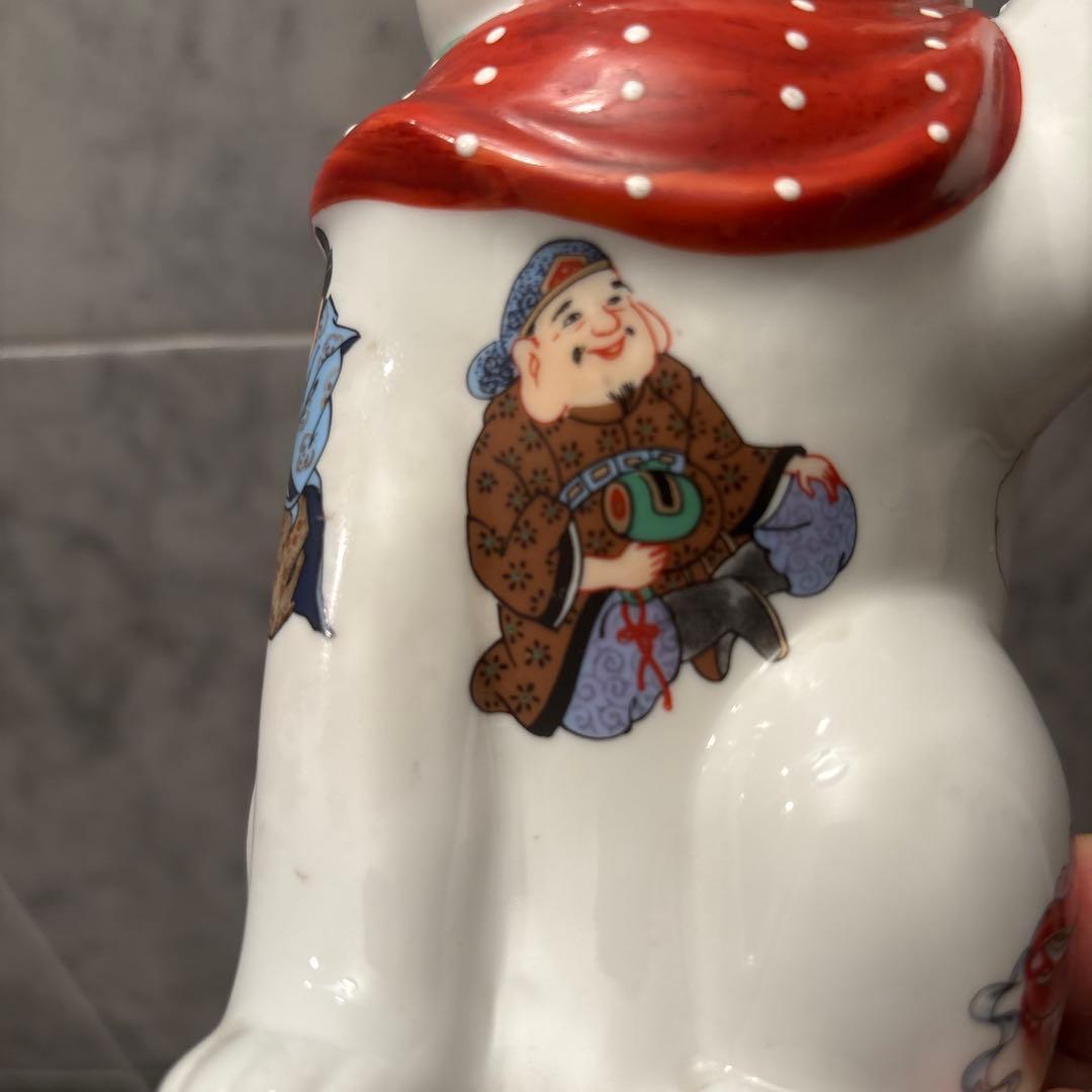 ヴィンテージ縁起の良い七福神が描かれ、可愛らしい瞳の招き猫