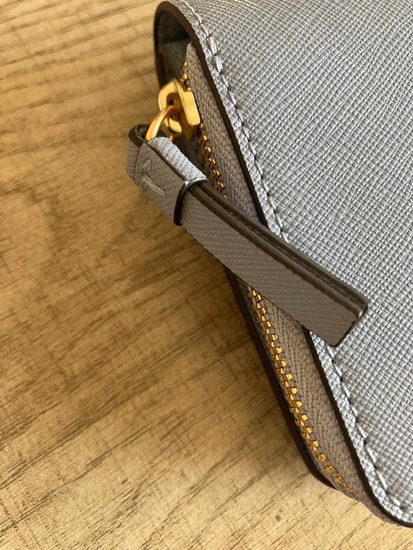 新品保管品　トリーバーチ　二つ折り財布　水色