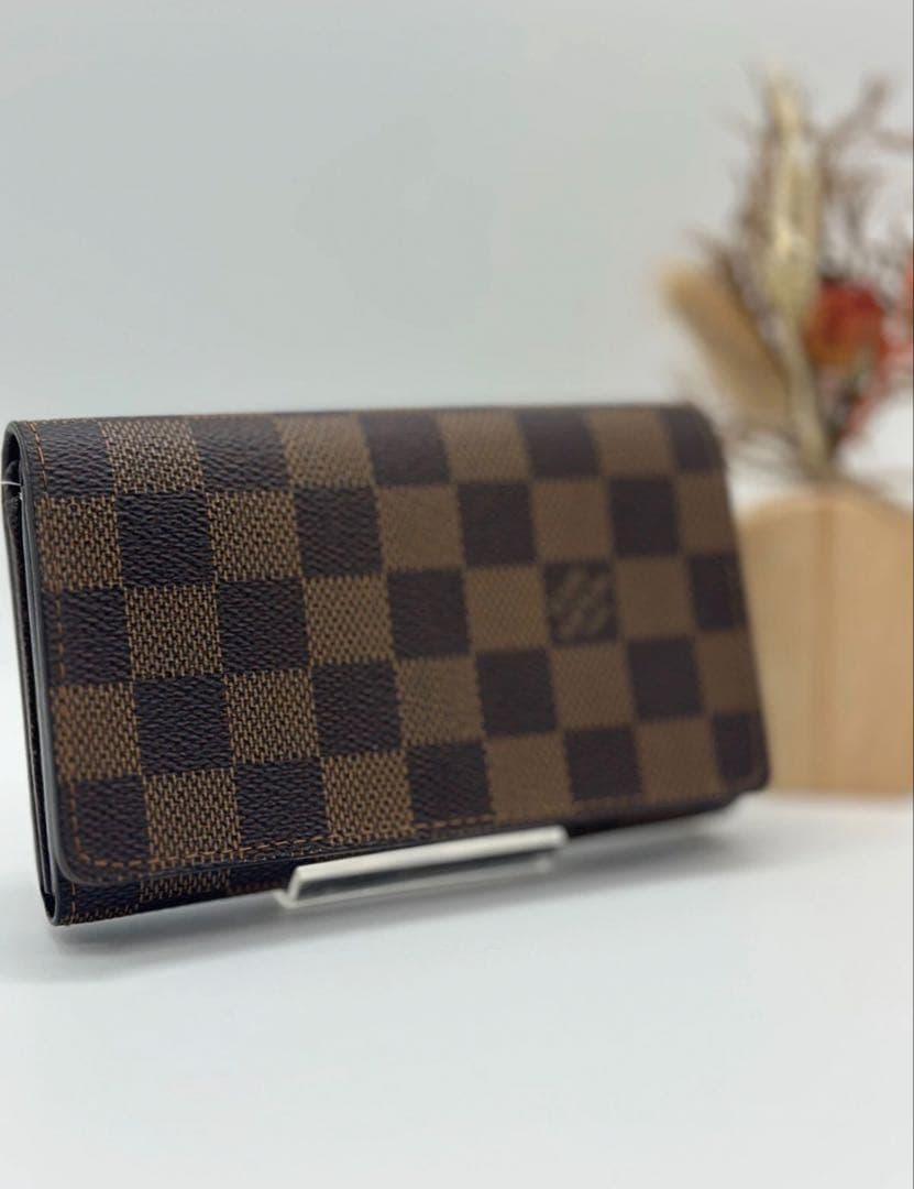 ルイヴィトン ダミエ エベヌ ポルトモネビエ トレゾール 二つ折り財布