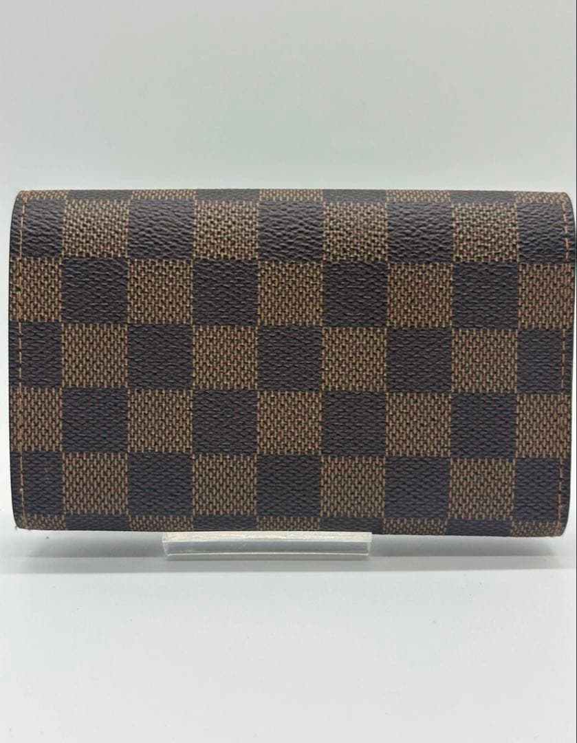 ルイヴィトン ダミエ エベヌ ポルトモネビエ トレゾール 二つ折り財布