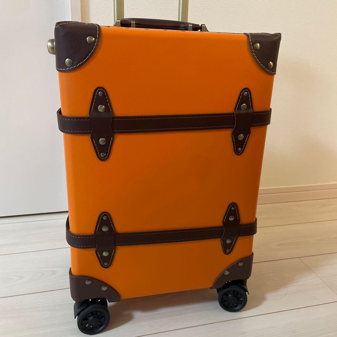 キャリーケース　トランク　スーツケース　オレンジ　旅行