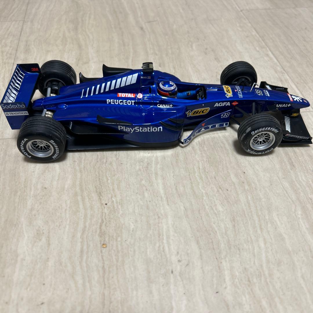 ミニチャンプス　1/18 Prost Peugeot AP02 1999