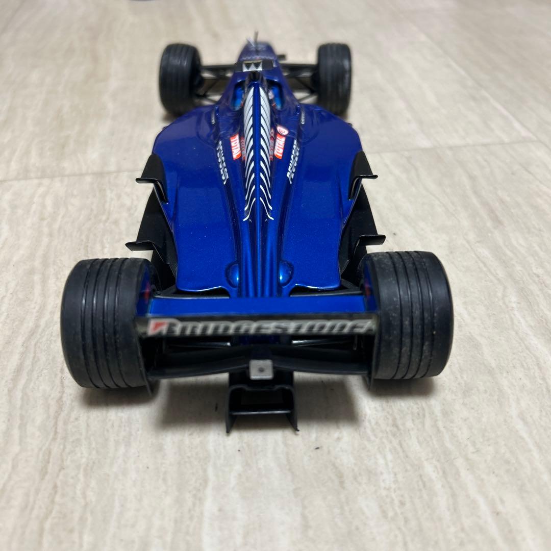 ミニチャンプス　1/18 Prost Peugeot AP02 1999
