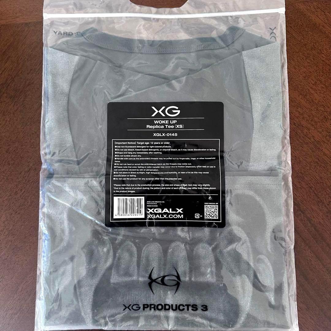 XG WOKE UP Replica Tee XSサイズ 新品未開封