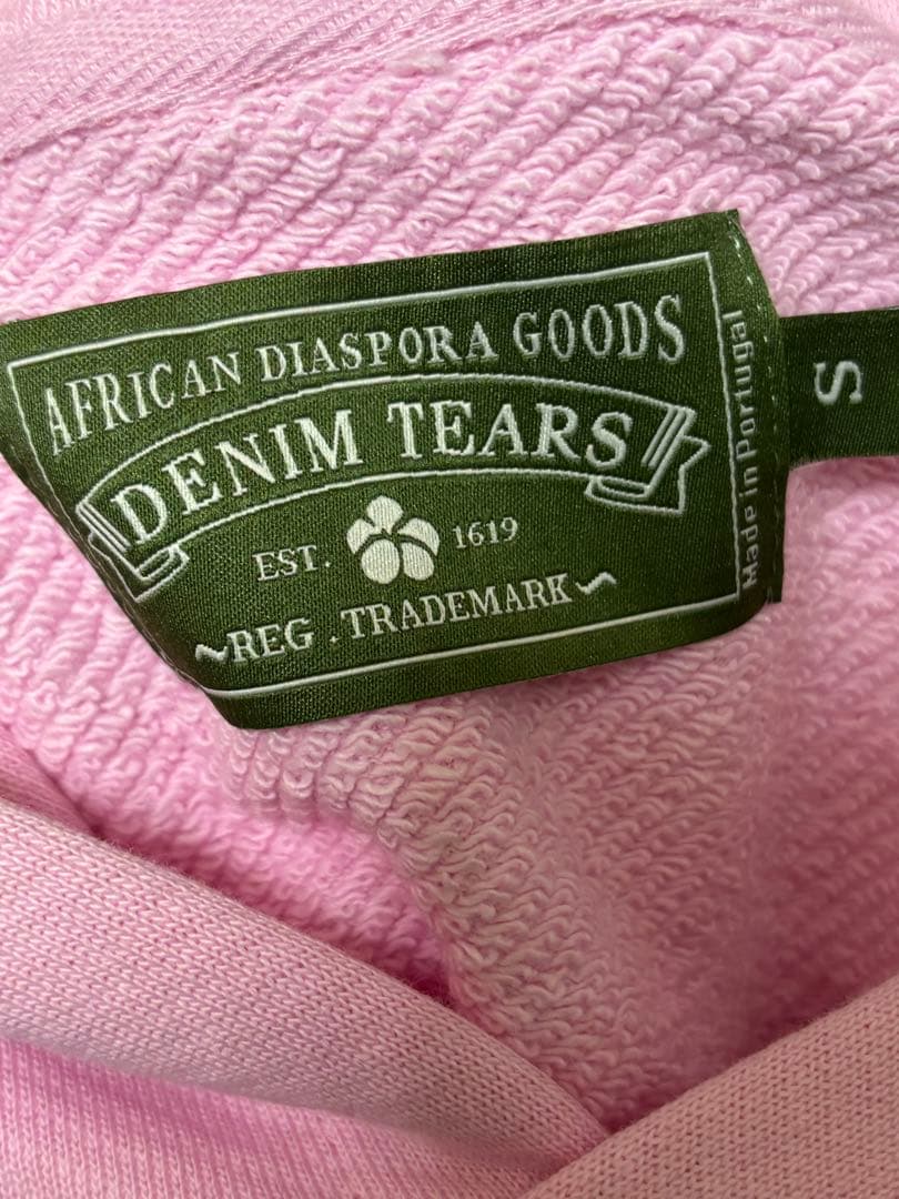 denim tears ピンク パーカー