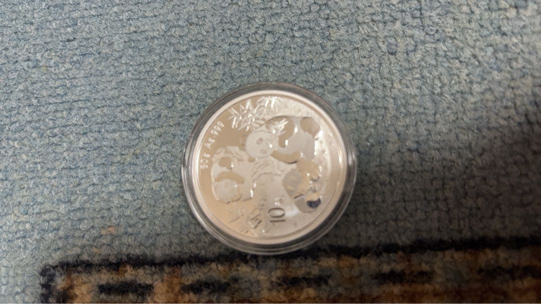 メルハン銀製パンダ硬貨 10元＆トケラウクロノス銀貨保証書画像あり