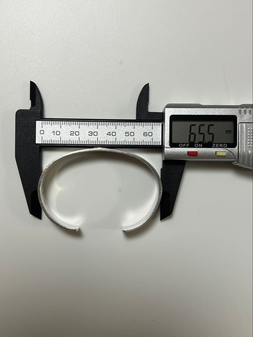 タディ&キング 平打ちバングル SV K18ロングホーンメタル