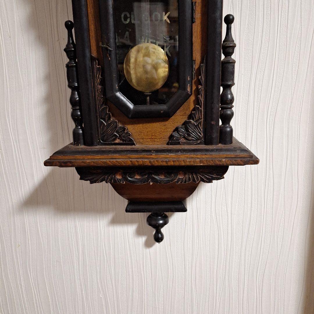 324 彫刻入り振り子掛時計　小型ひまわり柱時計