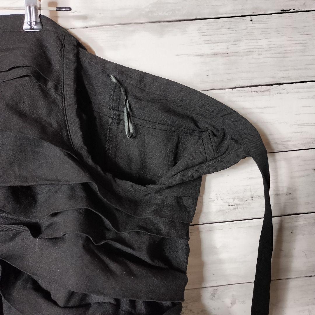 コムコム コムデギャルソン ポリエステル縮絨 巻きスカート ひざ丈 フリル