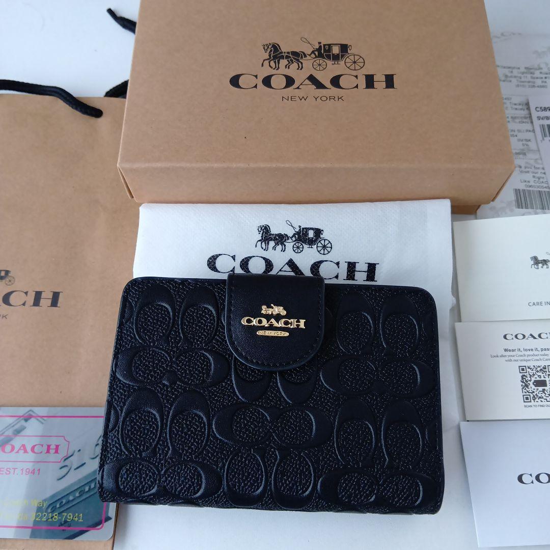 ✨️COACH ブラック シグネチャー✨️　二つ折り財布　保存袋＆お箱付き