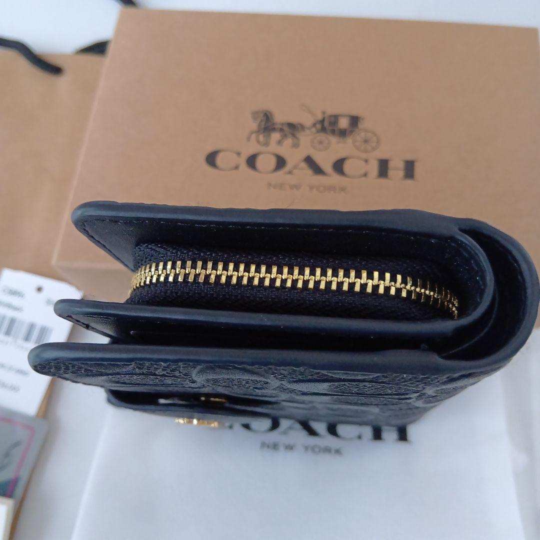 ✨️COACH ブラック シグネチャー✨️　二つ折り財布　保存袋＆お箱付き