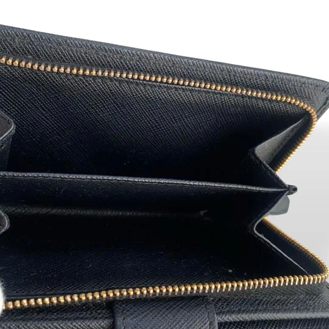 プラダ　二つ折り財布　ネイビー　レディース