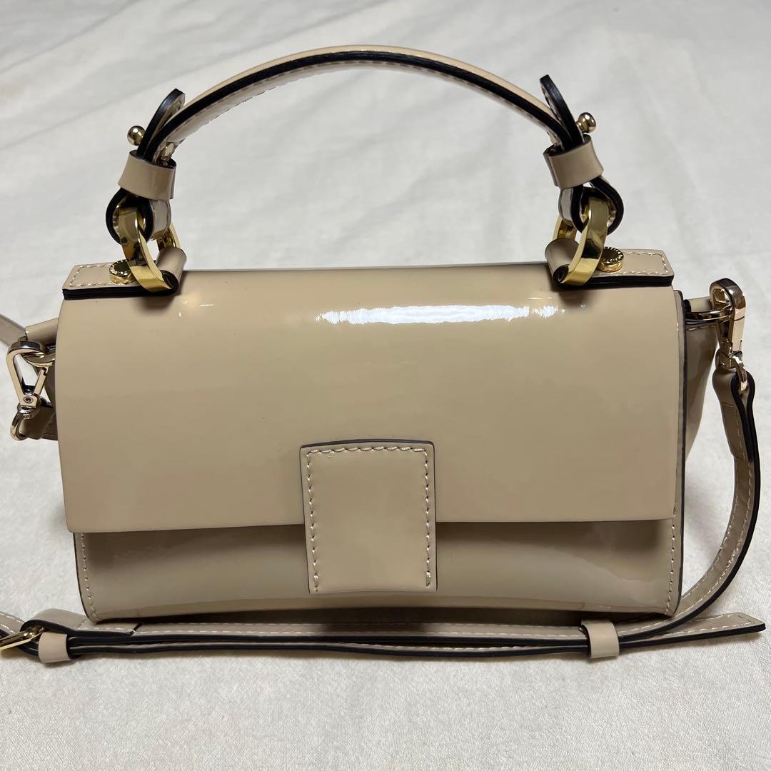 ロリステッラ　エナメルバッグ　ベージュ