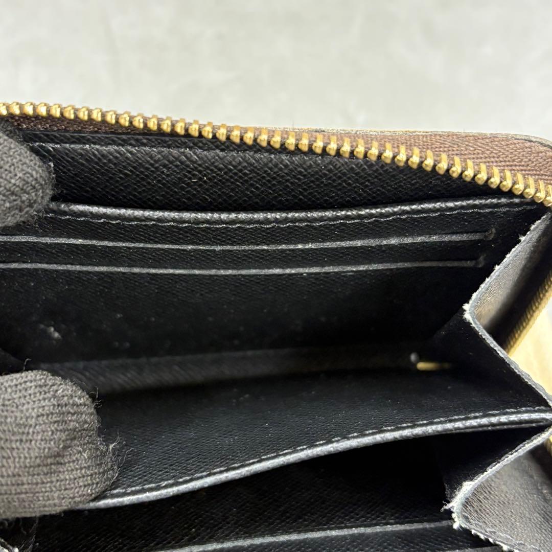 YUNO　ジャイアントモノグラム ジッピーケース M69354