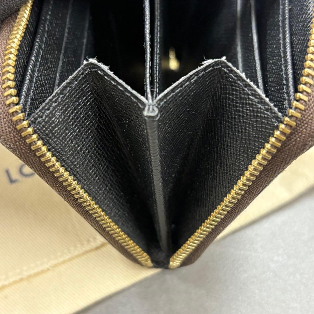 YUNO　ジャイアントモノグラム ジッピーケース M69354