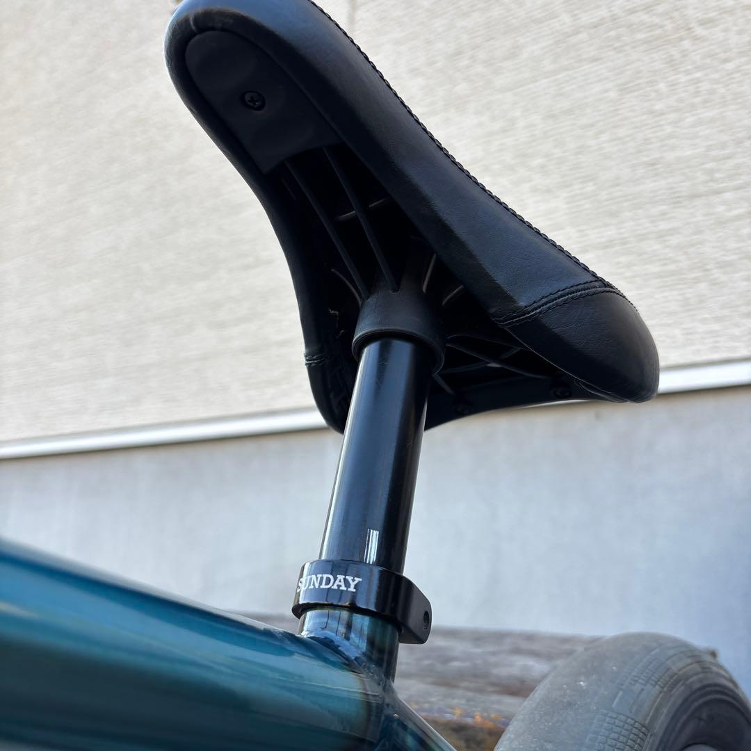 青緑色 BMX バイク