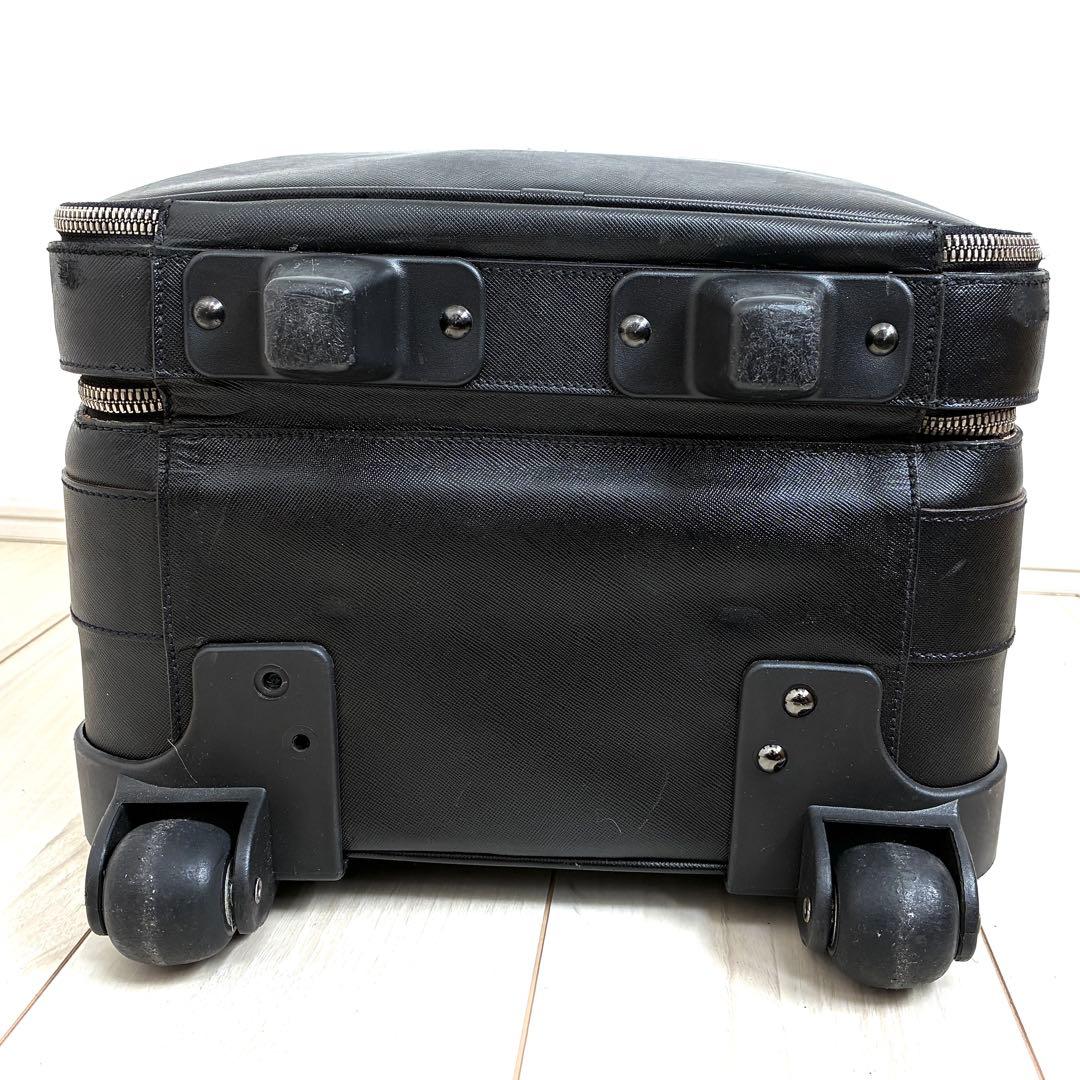 正規品 プラダ キャリーケース 三角ロゴ 白タグ サフィアーノレザー メンズ 黒