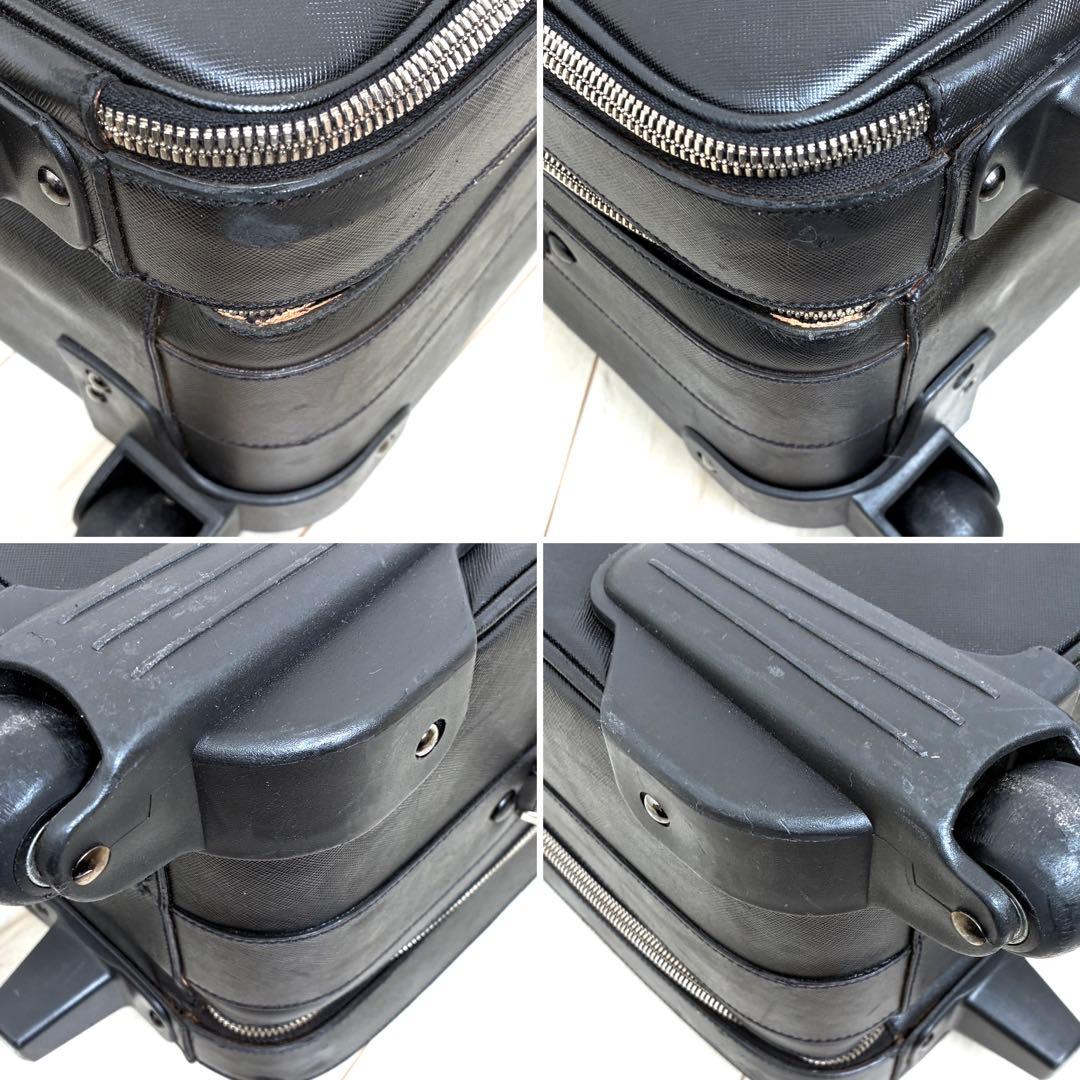 正規品 プラダ キャリーケース 三角ロゴ 白タグ サフィアーノレザー メンズ 黒