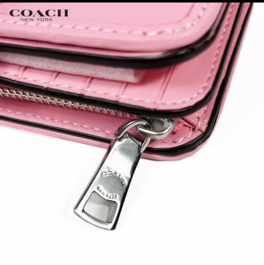 COACHコーチタビー ミディアム ウォレット 二つ折り財布.ビビッド ピンク