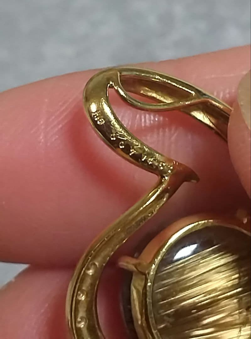 14.50ブラウンルチルキャッツアイダイヤ0.07入りk18ペンダントトップ