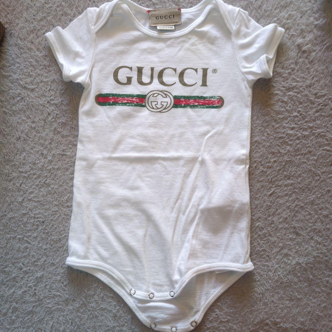 GUCCI ロゴ入りボディスーツ