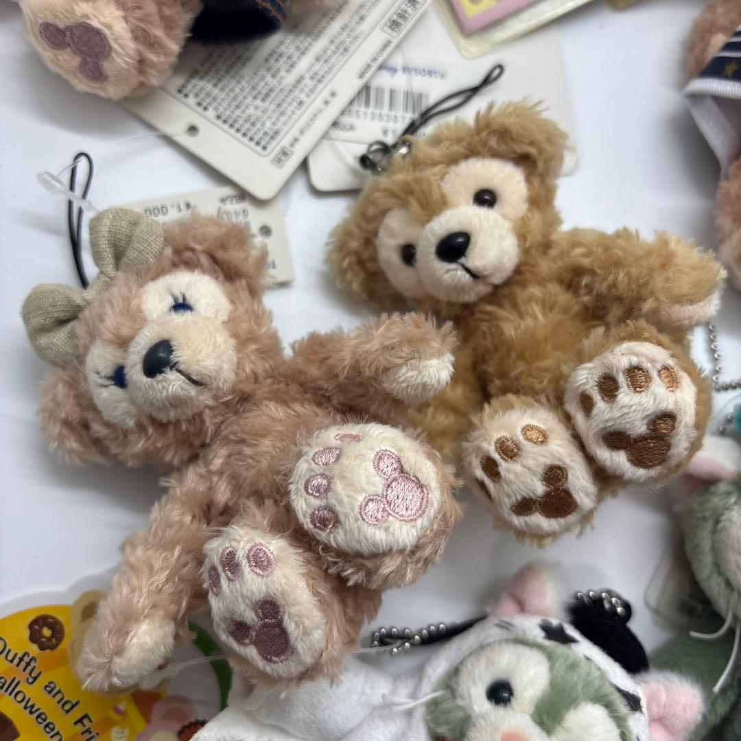 新品未使用タグ付き Disne ディズニー ジェラトーニ ぬいぐるみバッジ