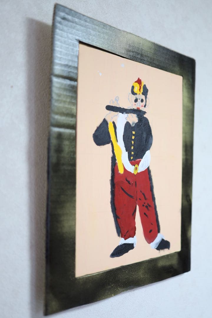 小学生が描いた「笛を吹く少年」