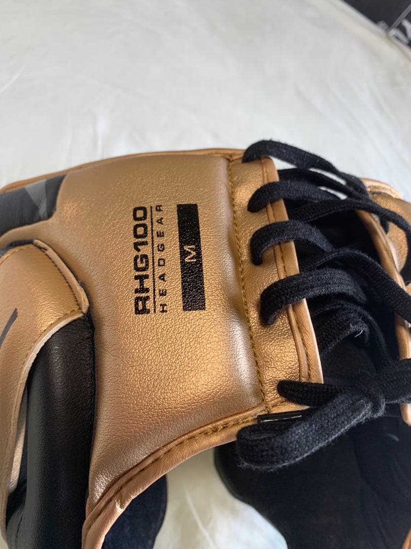 RIVAL ヘッドギア 黒/金 耳保護付き