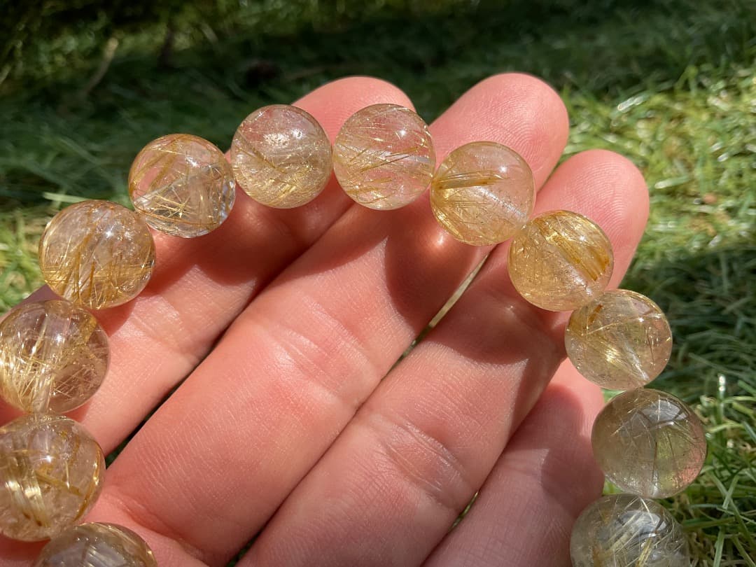 最終価格タイチンルチルクォーツブレスレット約12mm玉内周約16.5cm