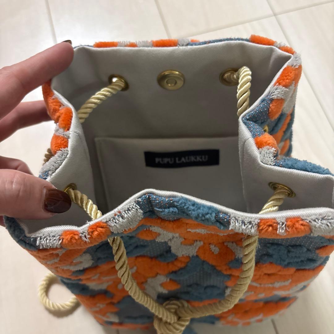 PUPU LAUKKU 金華山巾着　水色とオレンジのマグノリア　花柄巾着バック