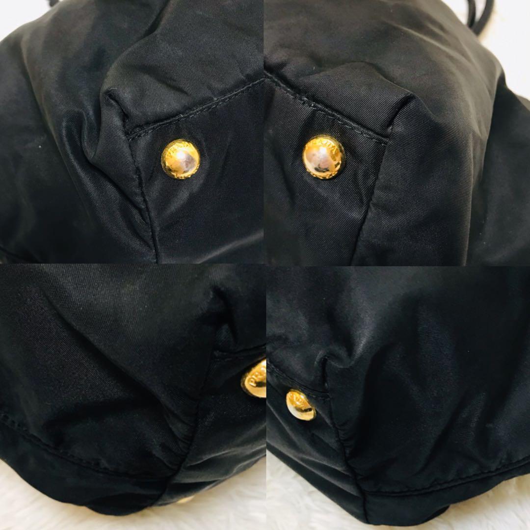 【美品】プラダ ハンドバッグ リボン ゴールドロゴ ナイロン 黒 ロゴプレート