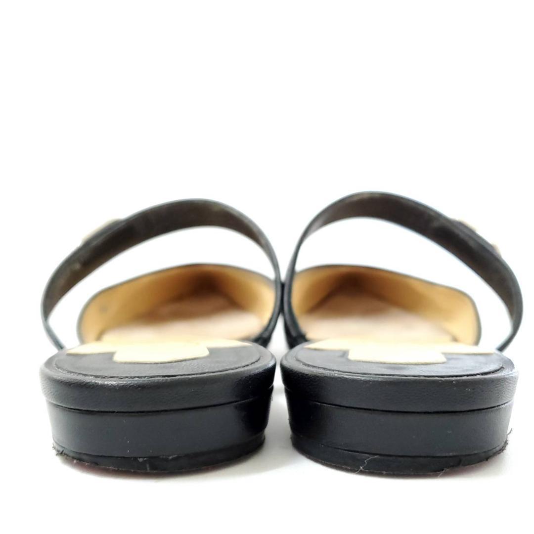 クリスチャンルブタン　ストラップミュール　金具　ポインテッドトゥ　レザー　黒