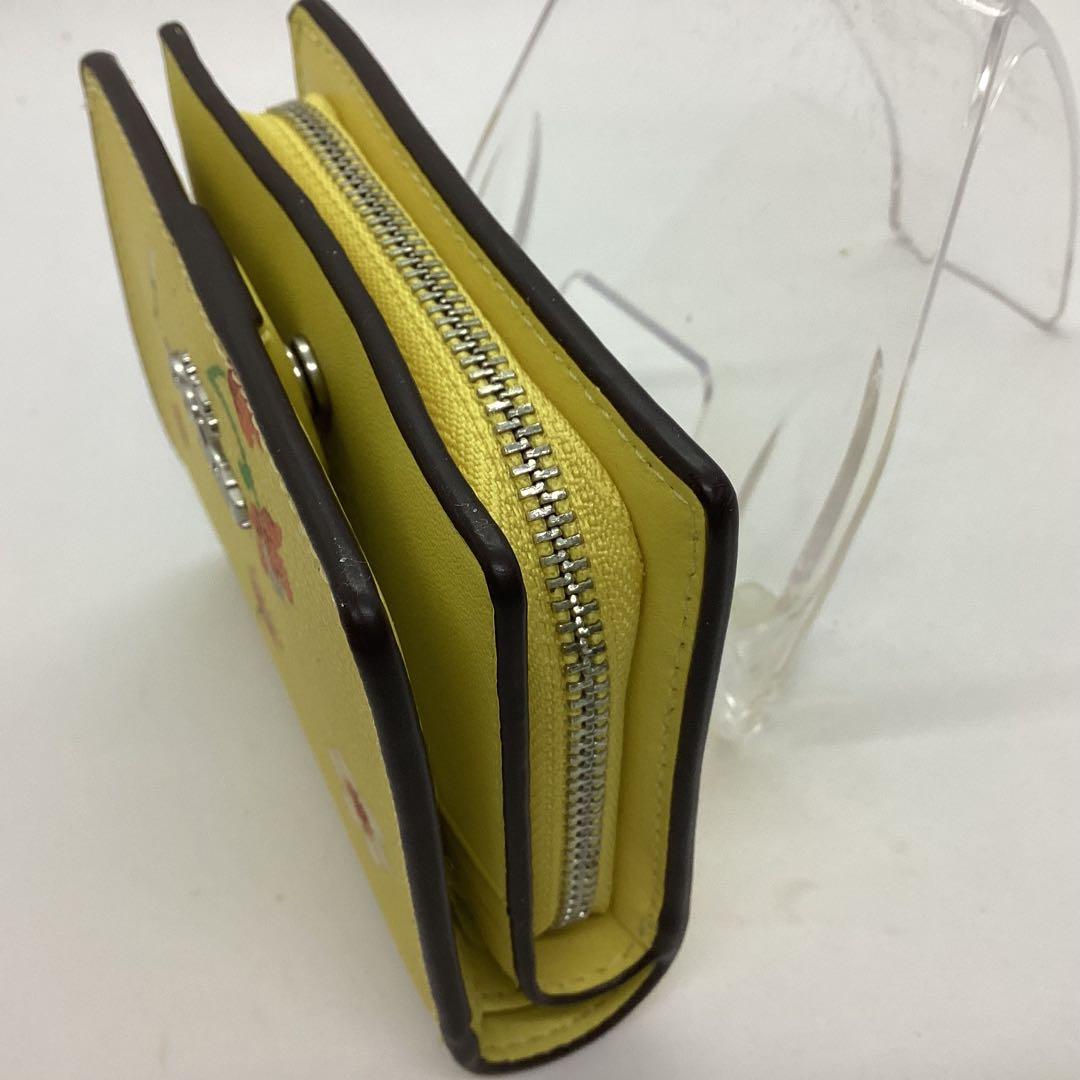 COACH 花柄 二つ折り　コンパクト　財布 イエロー