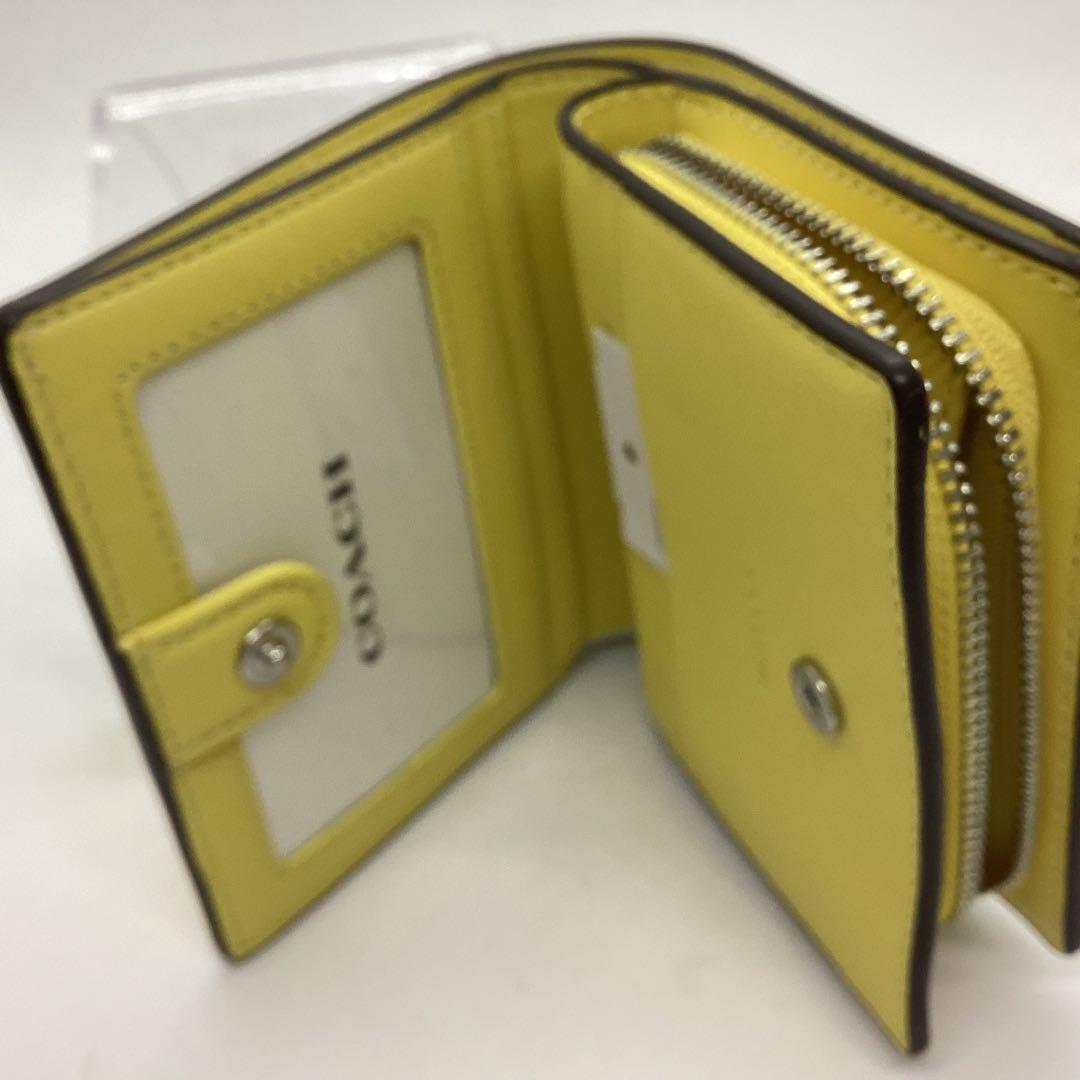 COACH 花柄 二つ折り　コンパクト　財布 イエロー