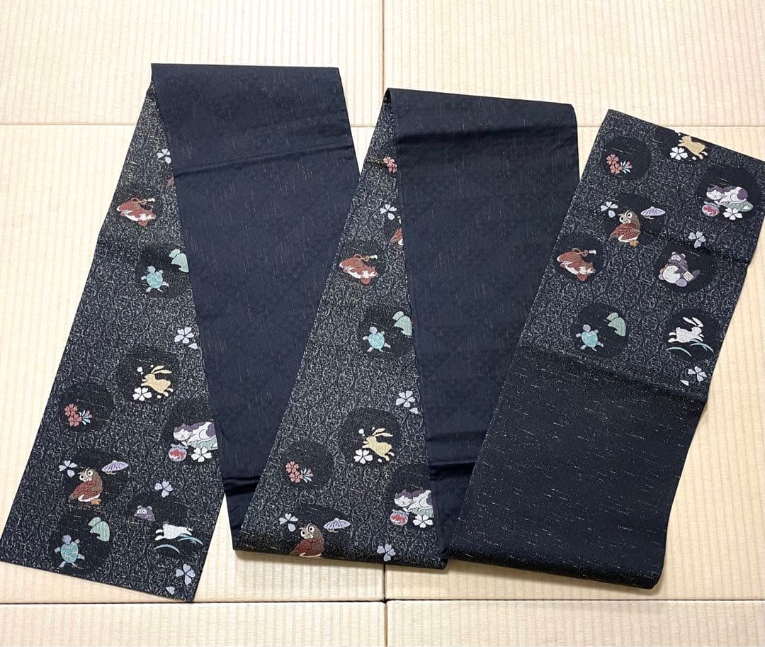 猫 たぬき うさぎ ふくろう 亀 金通し 黒地 袋帯