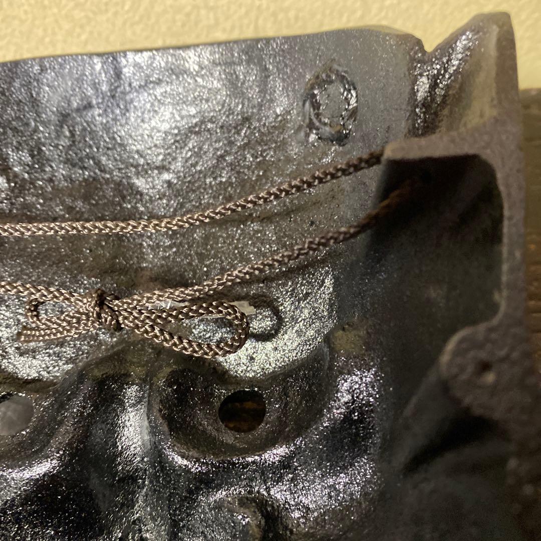 鬼の面 黒色 金色の歯