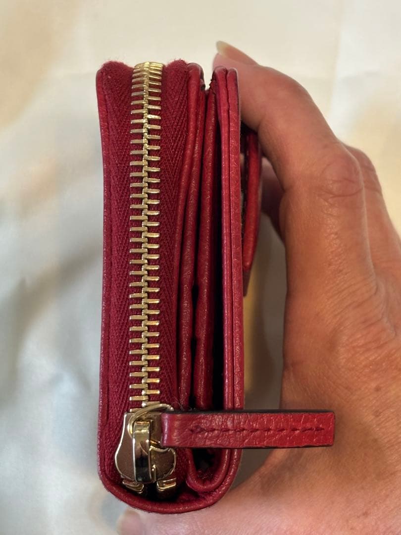 GUCCI GGパターン 二つ折り財布コンパクトウォレットラウンドジップ