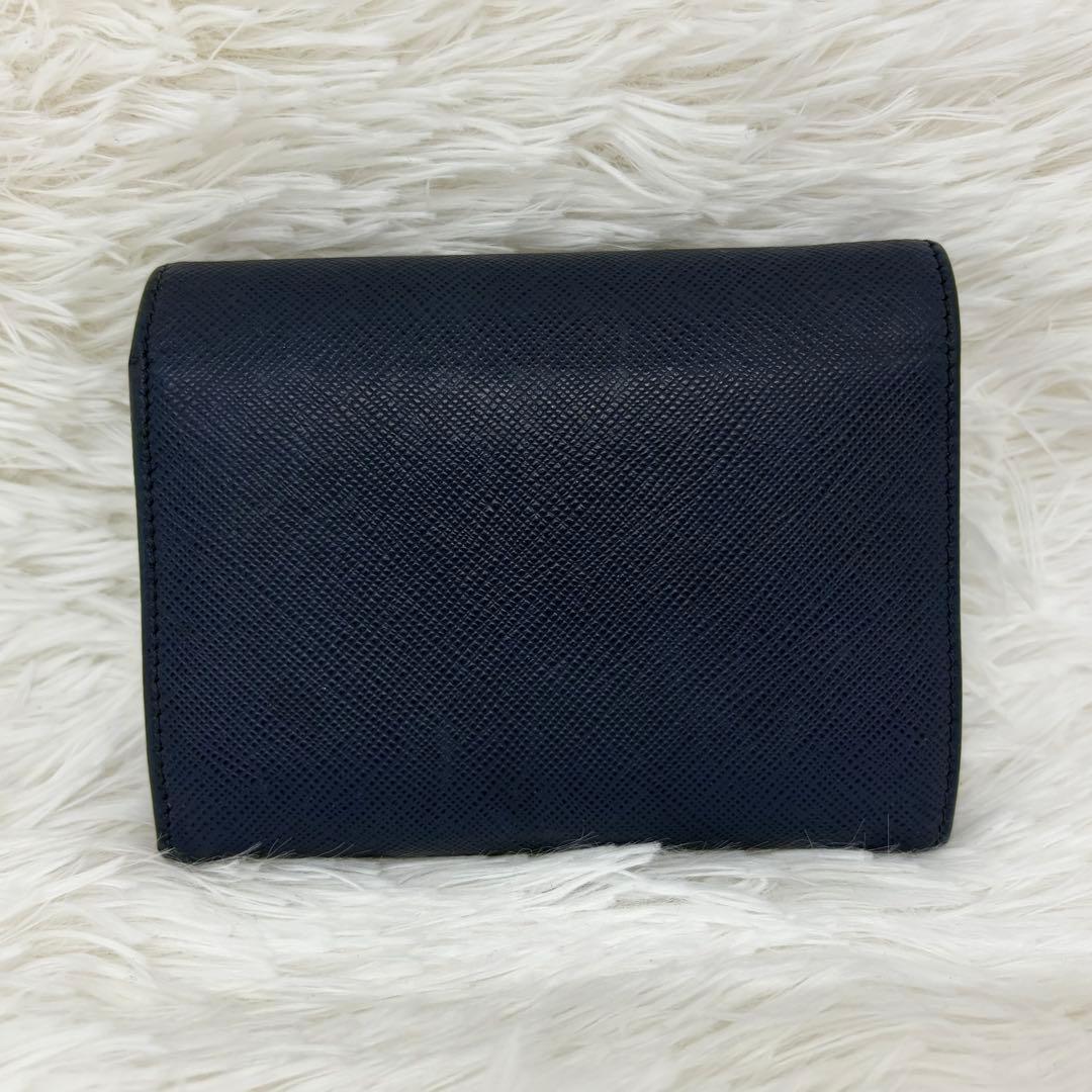 美品✨プラダ 三つ折り財布 財布 サフィアーノ レザー リボン ネイビー 紺