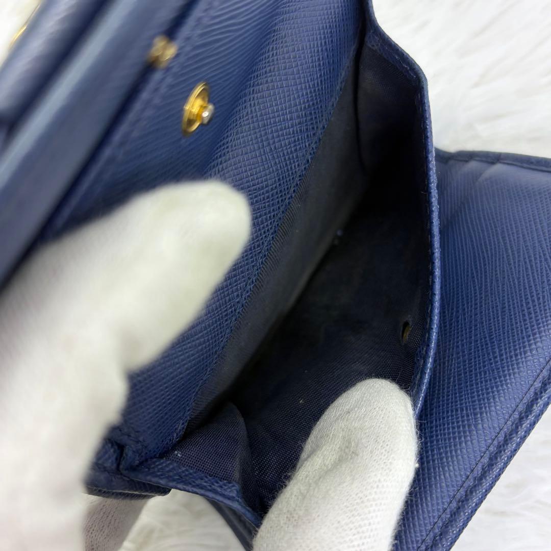 美品✨プラダ 三つ折り財布 財布 サフィアーノ レザー リボン ネイビー 紺