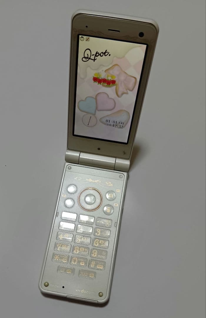 ドコモ　携帯電話　Q-POT SH04C ビスケット　ガラケー