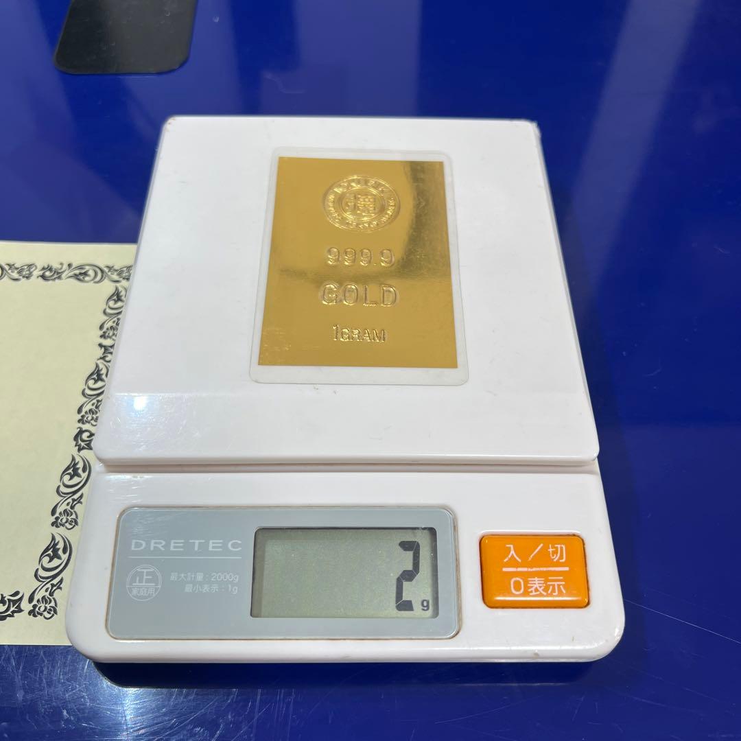 徳力・純金1g・ラミネート・保証書付き