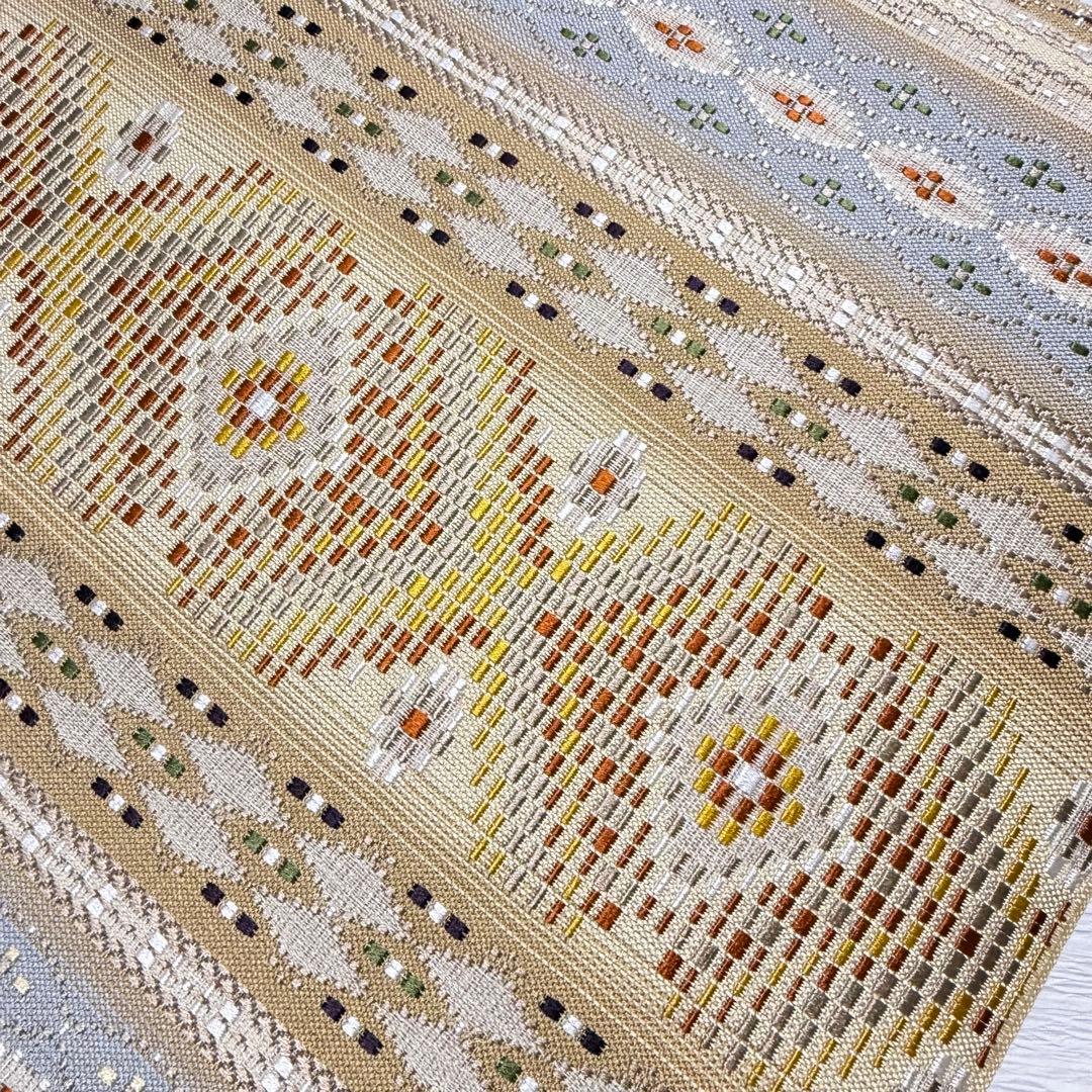 m-22 本場琉球 島花織 幻想雪輪文 袋帯 正絹 2通り 両面 未使用